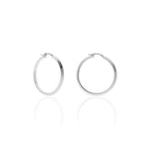 Orecchini argentati a cerchio 549494