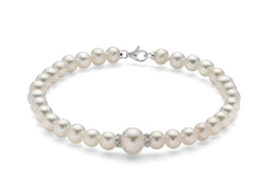 + Bracciale di perle con dischi di diamanti e oro bianco