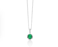 + Collana con smeraldo ovale e tre diamanti in oro bianco