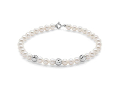 +Bracciale di perle Oriente con tre sfere diamantate in oro bianco 375