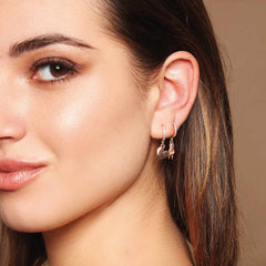 MONO ORECCHINO CON SOGGETTO CORNA