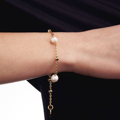 Bracciale in bronzo dorato e perle naturali 523452