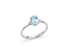 Anello con Gemma del Cielo ovale affiancata da diamanti in oro bianco 375